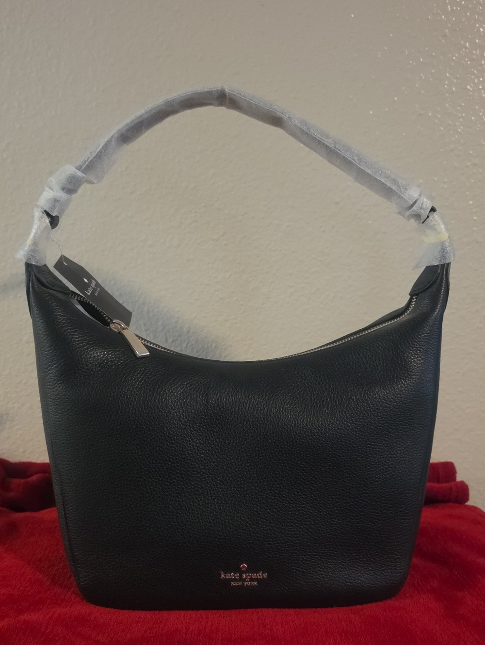 kate spade black pebbled leather hobo with gold logo